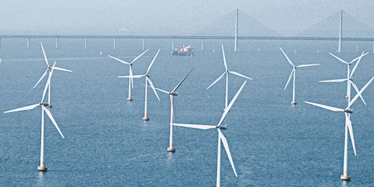 Dieses Bild zeigt Windräder und verdeutlicht das Thema Fossilfrei innerhalb einer Generation