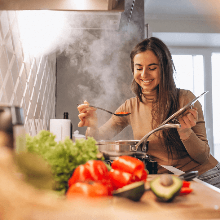 Frau am Kochen